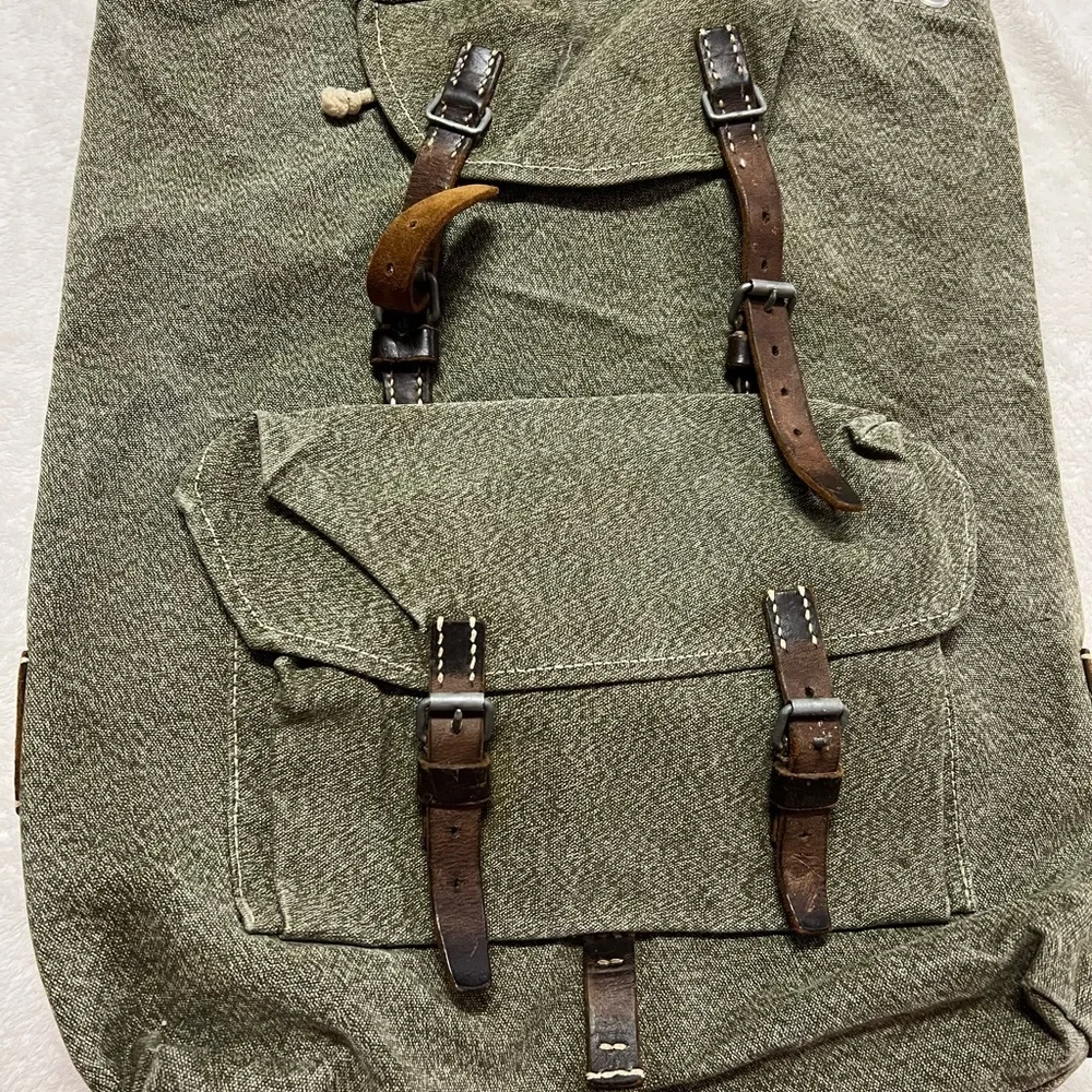 Swiss army inspired back pack leather accents
